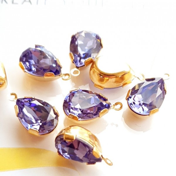 4320 14x10mm Tanzanite F Pear shape Fancy stone ietvarā ar cilpu, zelta p.(x1)